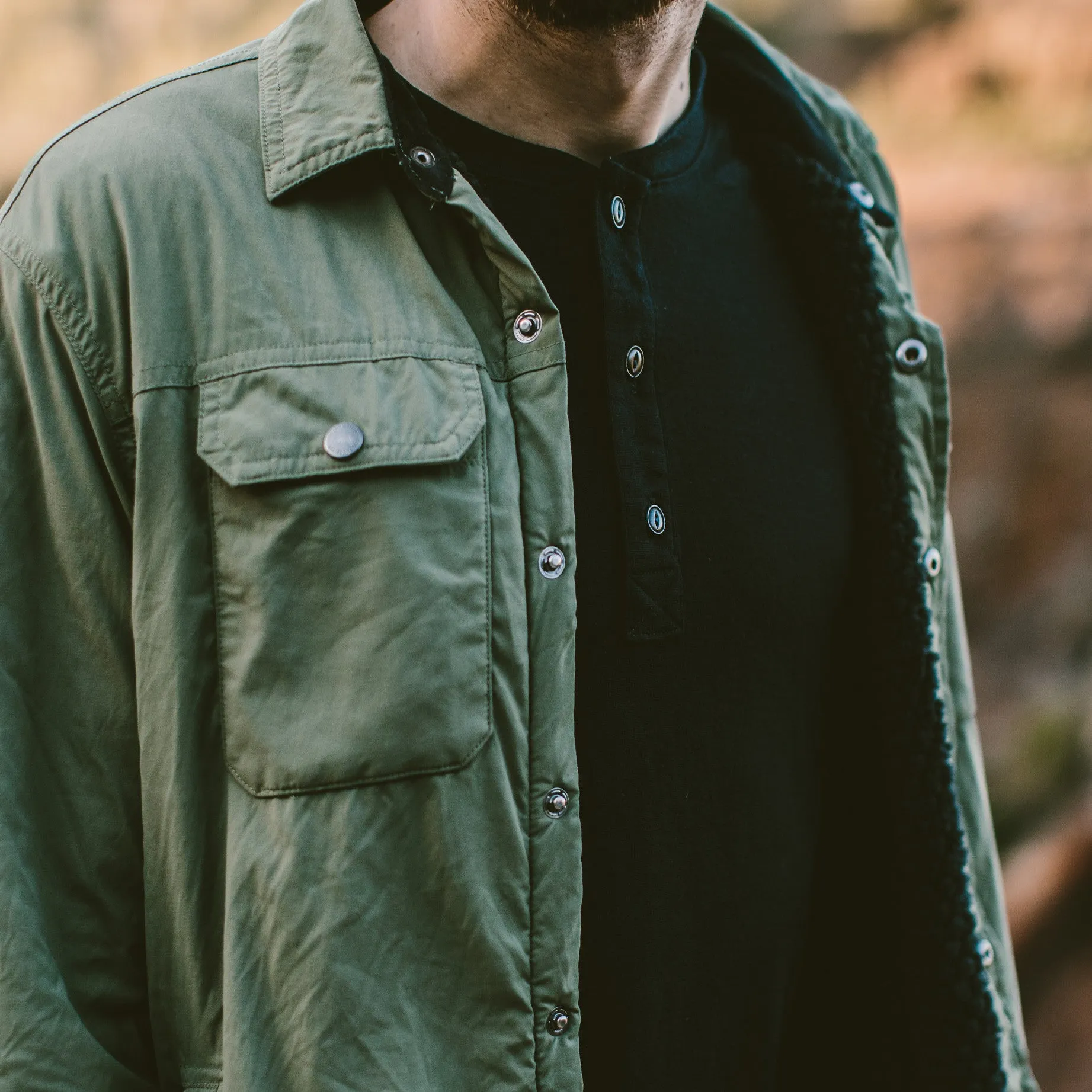 The Short Sleeve Henley in Black Merino